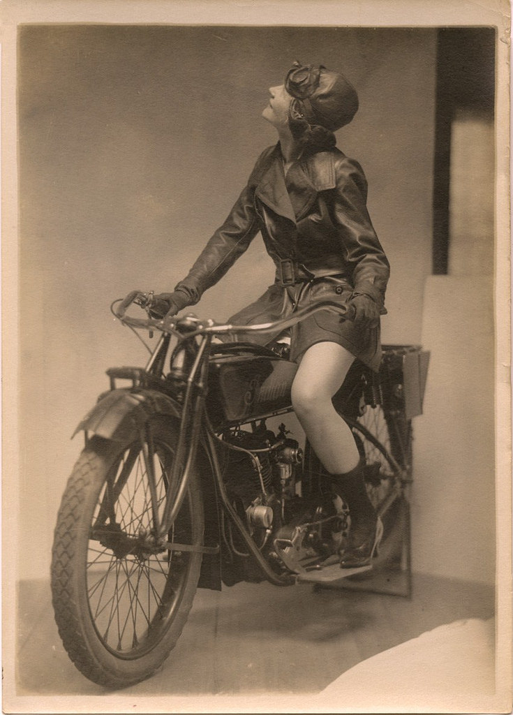 Eileen Percy on an Indian motorcycle in an ad for Fox Shoes, ca. 1920s