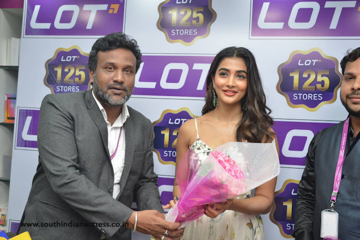 Pooja Hegde at Lot Mobile Store in Vijayawada