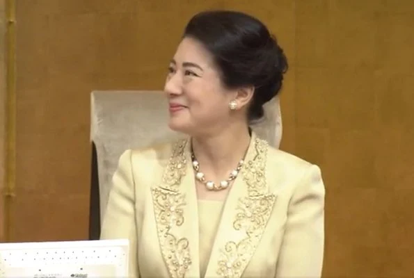 Crown Princess Masako is wearing a dress from the 1990s, or a beige dress with similar design 