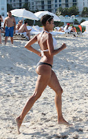 Nicole Murphy running on the beach