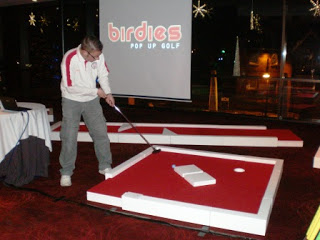 Putting at the launch event for Birdies Pop Up Golf