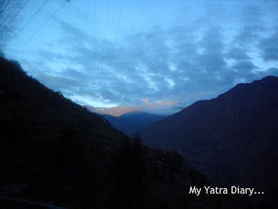 Mountains, cloud cover and sunrise in the Garhwal Himalayas