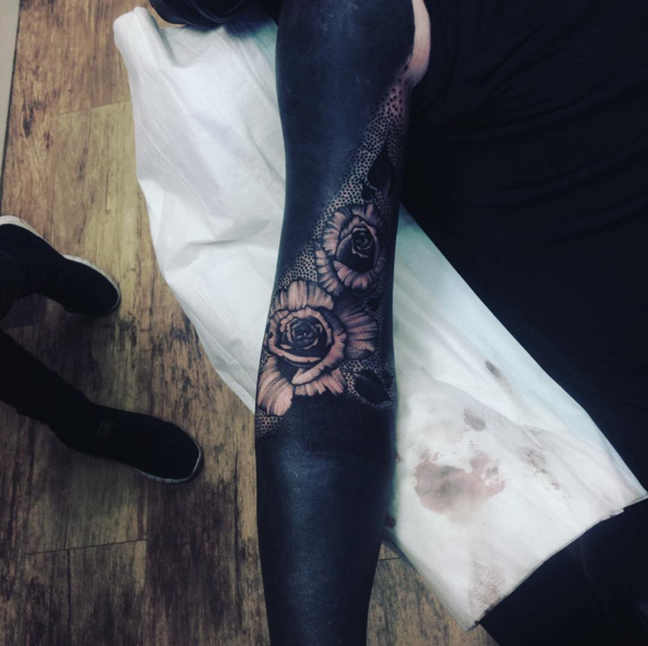 large rose blackout tattoo