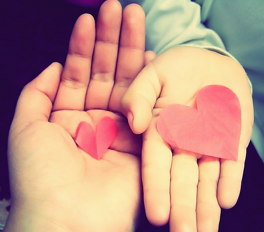 mother child hands hearts