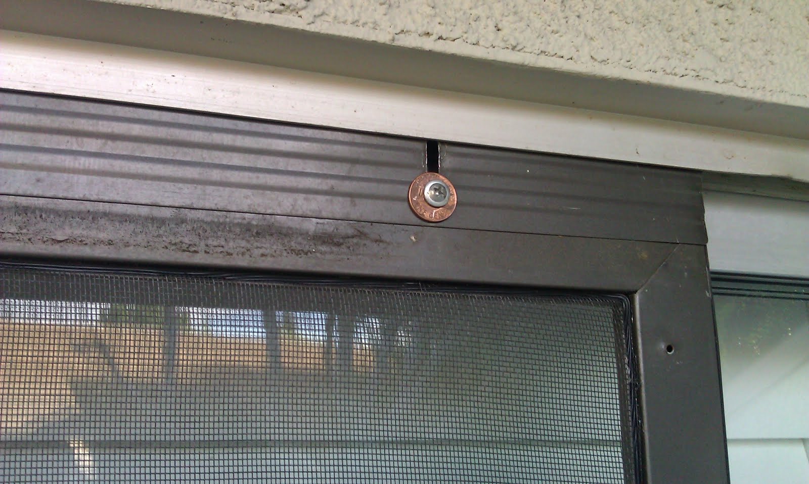 South County Girl Homemade screen door fix... on the cheap