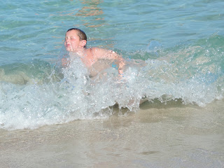 playing in sea waves mallorca cala beach