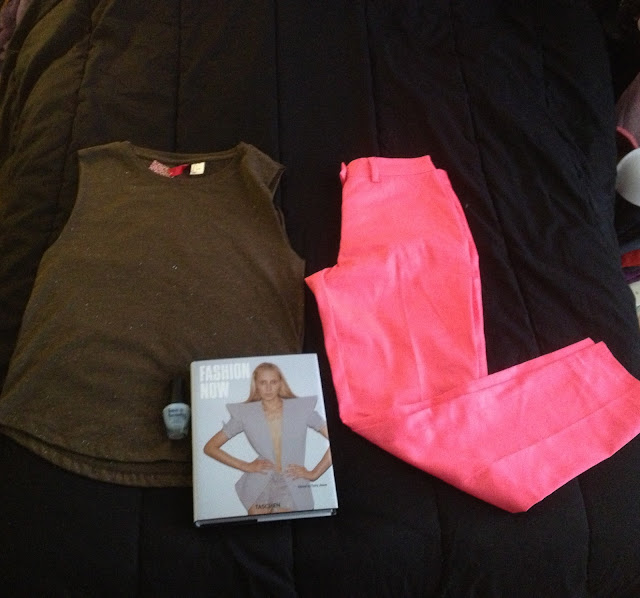 Army green muscle tee, bright pink trousers and Fashion Now book-HM
