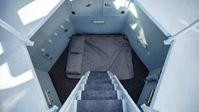 04-Master-Bedroom-Kurt-Hughes-Earth-Architecture-with-the-Lunar-Lander-Tiny-House-www-designstack-co