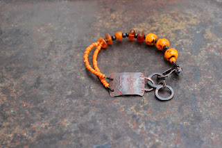 orange shaman rockpainting bracelet