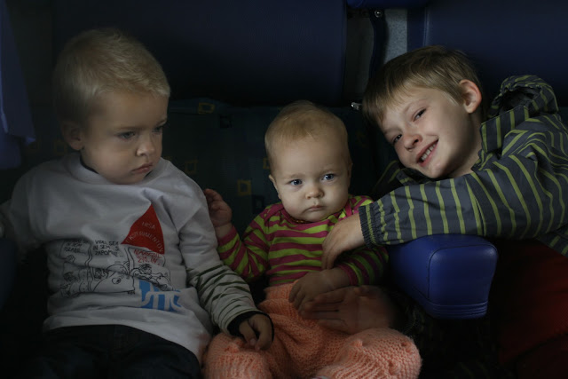 Anton, Neve and Matti on the train to Postojna.