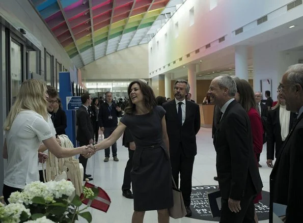 Crown Princess Mary attended the opening of OECD forum at Oecd Conference Centre in Paris. wore Prada dress Gold earrings