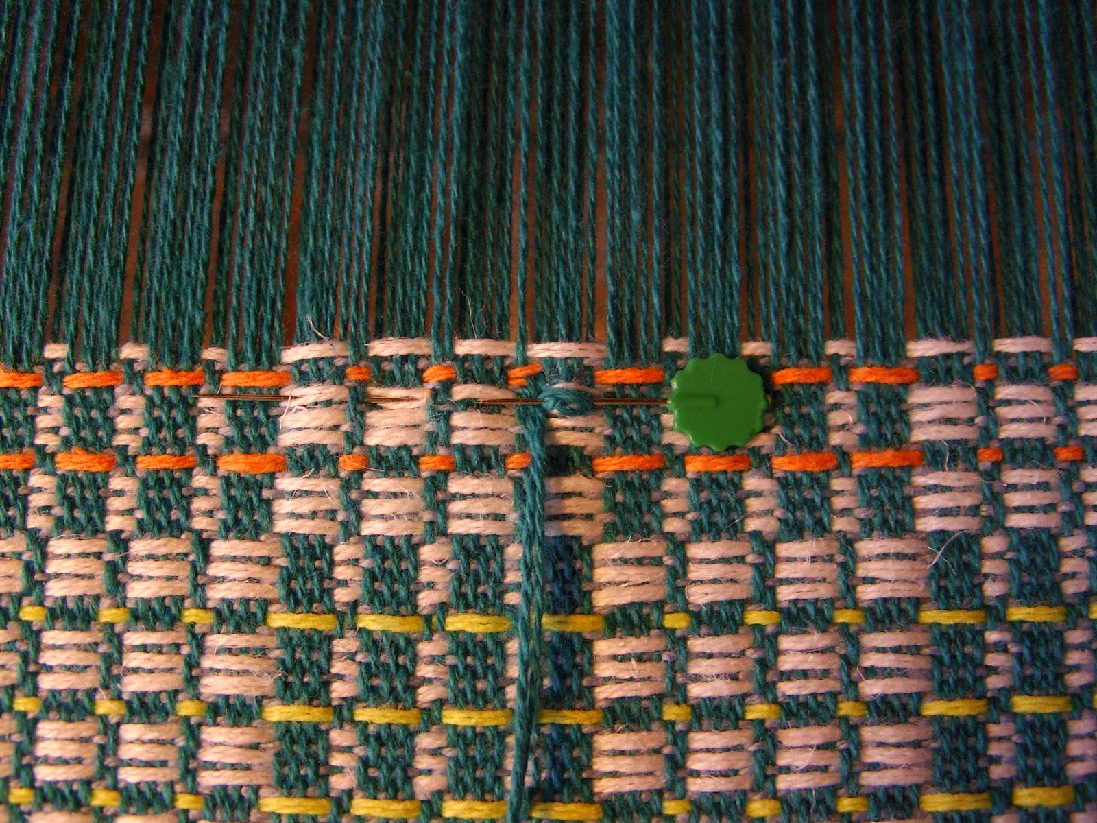 Daisy Hill Weaving Studio: Repairing a Broken Warp Thread on the Loom