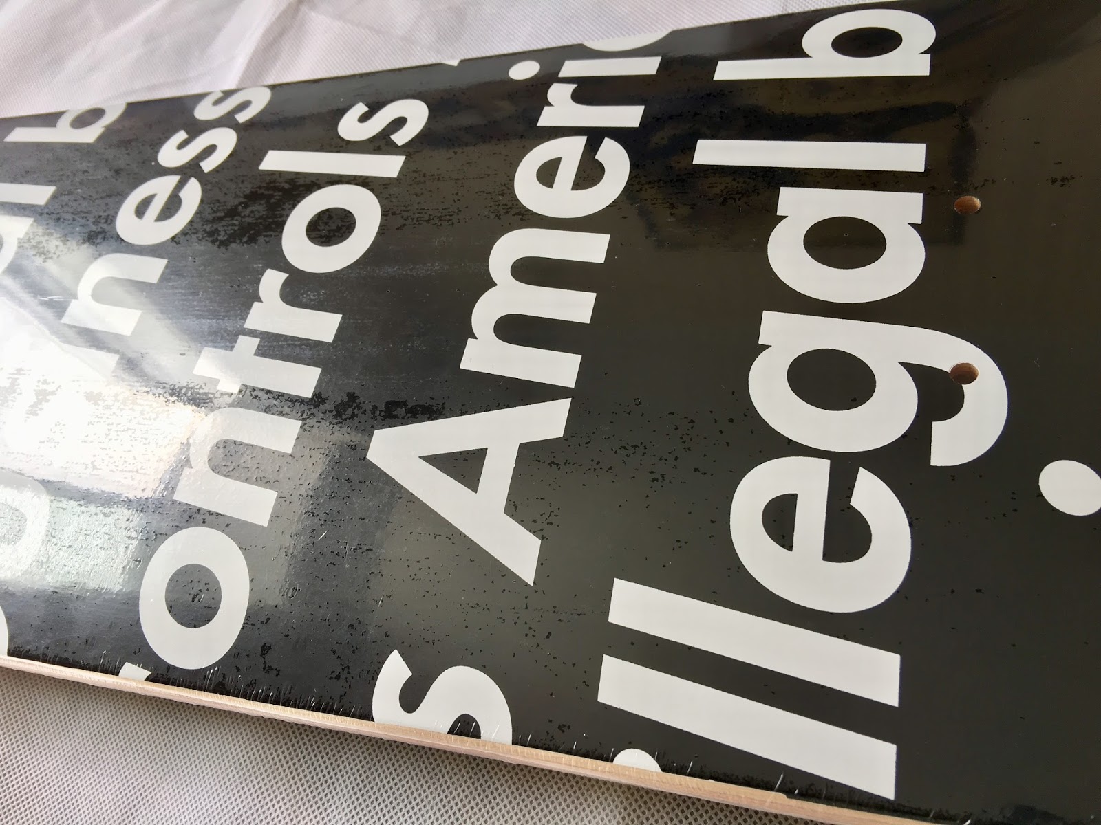 supreme illegal business skateboard