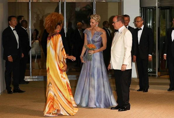 Prince Albert and Princess Charlene attended the 68th annual Monaco Red Cross Gala, Charlene wore Velentino Gown dress, Cartier Diamond Earrings