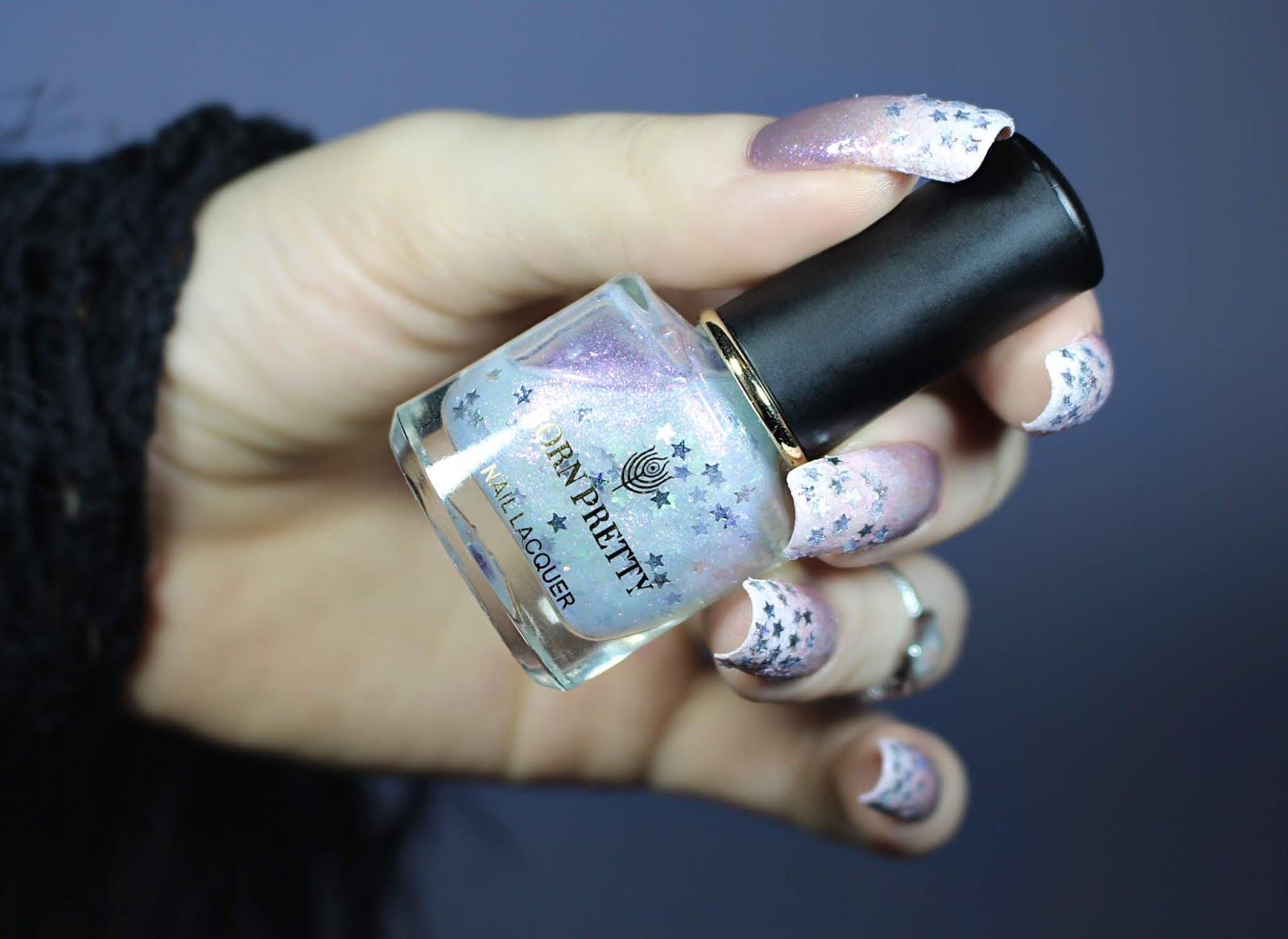 beautiful sparkly manicure in lilac and white colors