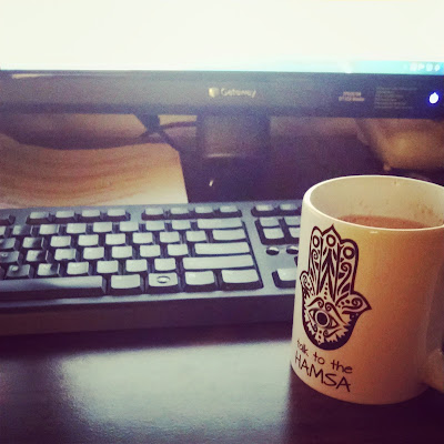 hamsa coffee mug keyboard office workstation break time