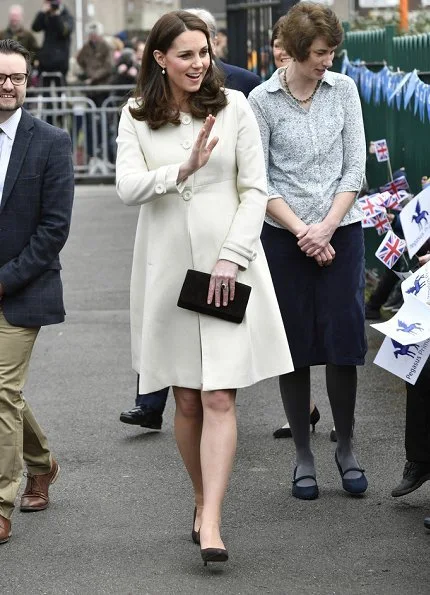 Kate Middleton wore JoJo Maman Bebe Maternity Princess Coat, with her Annoushka pearls and Kiki McDonough hoops and carried suede Emmy clutch