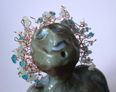 clay mermaid with copper hair and sea glass closeup