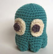 http://www.ravelry.com/patterns/library/amigurumi-pacman-ghost