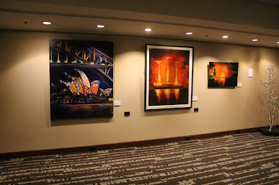 Oil Painting inspired by Vivid festival hanging in the Four Seasons Hotel The Rocks Sydney- Nocturne of Sydney Harbour Bridge  & Lighting the sails of the Sydney Opera House painted by artist Jane Bennett