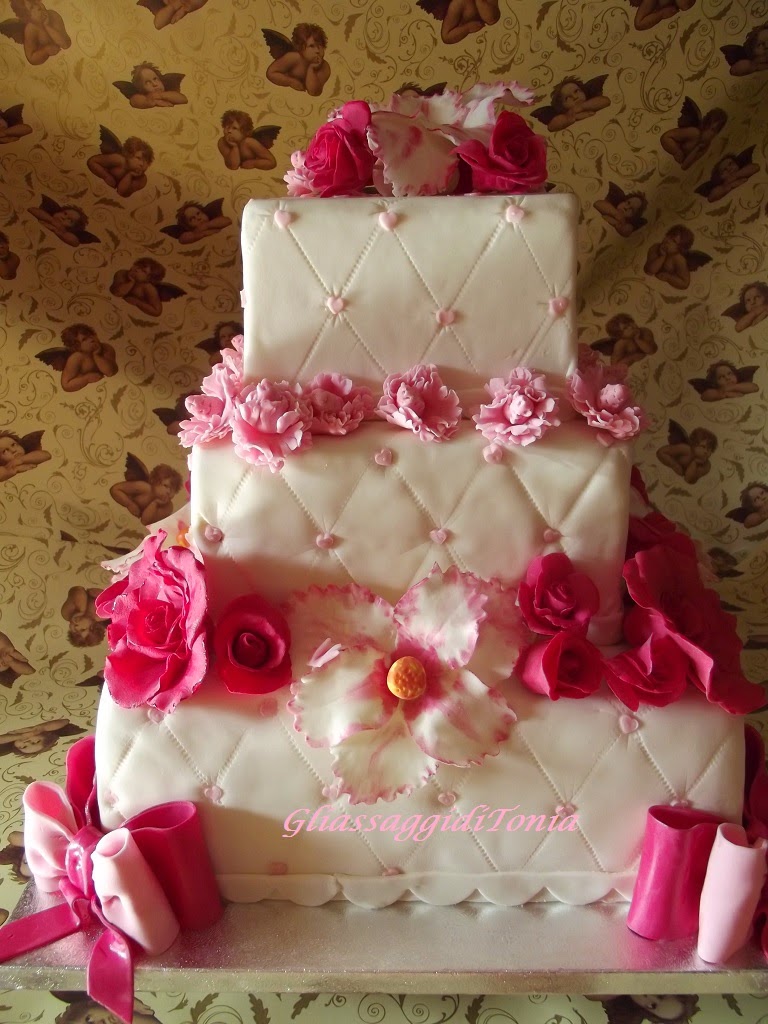 torta rose fiocchi e fiori di loto