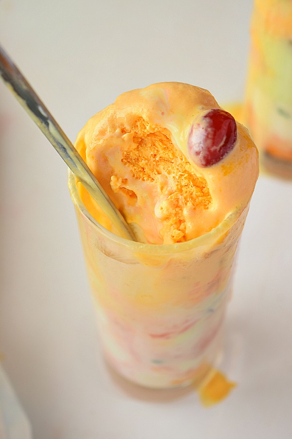 Sundae Ice Cream Gadbad tall glass with Mango Icecream and cherry on top