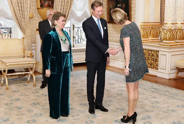 Grand Duke Henri and Grand Duchess Maria Teresa. Maria Teresa is wore greenvelvet suit. Princess Stephanie