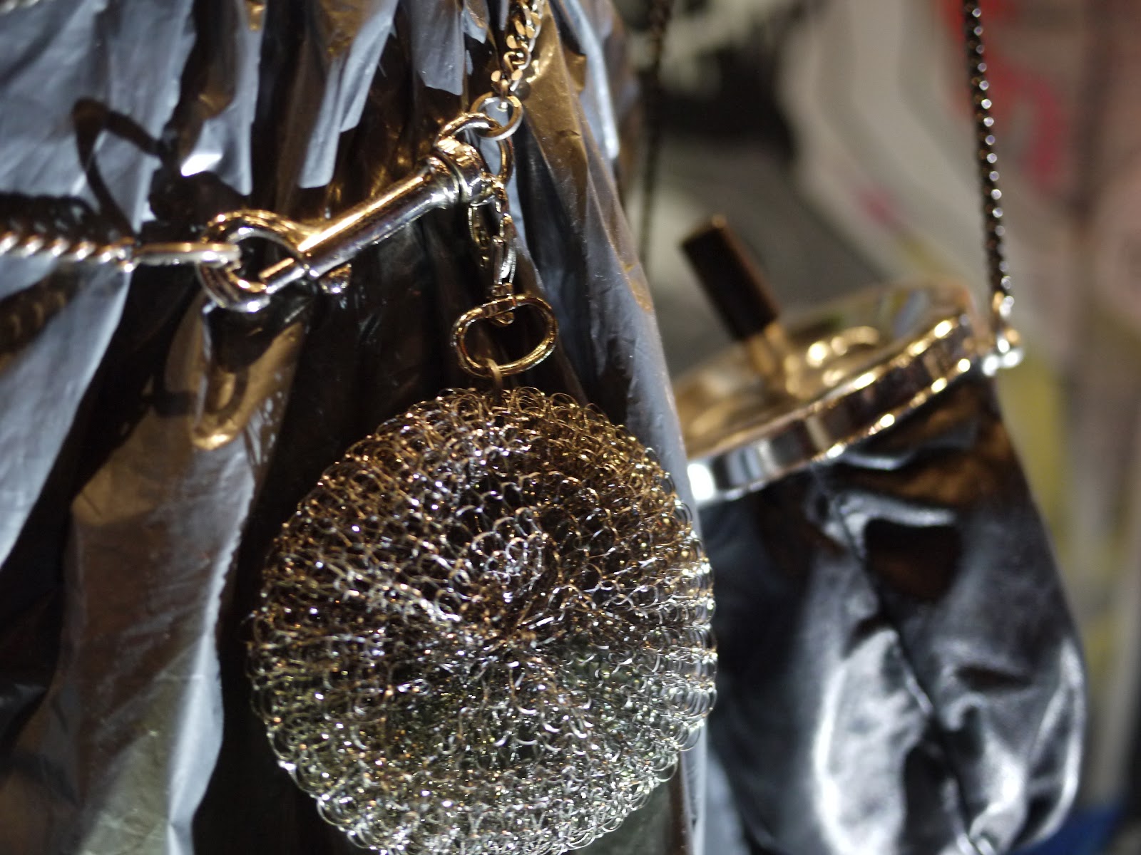 Scourer jewellery and ashtray handbag