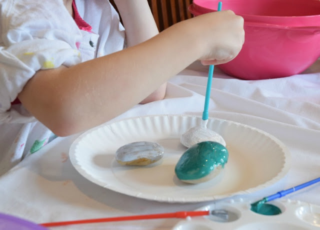 Painted Treasure Rocks- classic kids craft. Let your preschoolers, kindergarteners, or elementary children paint bright designs on rocks. Fun spring or summer activity. Give them away as gifts or decorate your garden!