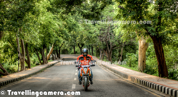 This Photo Journey shares some of the photographs of Himachal's first BAJAJ KTM DUKE200 and it's proud owner Mr. Aneesh Airborne Awasthi. If you don't know Aneesh, check out following links before proceeding with the latest Journey - CLIMBING, FALLING, STUMBLING & FALLING on the way to Hatu Peak in snow...Motorbike Stunts by Aneesh...This photograph is clicked at Golf-course of Chandigarh Cantonment area at Chandi Mandir... Before actual shoot, it was a warm up session to have a round inside wonderful Cantonment area and see if we find something interesting by keeping security measures in mind... But finally we moved to the new Himalayan Expressway which bypasses Pinjore, Kalka & Parwanoo to save 1.5 Hrs traffic in these main towns. KTM Duke200 looks amazing in above photograph with lush green golf grounds...Aneesh bought the bike KTM DUKE200 in the month of May after getting it 2 months in advance. Have enjoyed riding her more in mountain's because of her responsive engine. He kept on going to Palampur and Shimla frequently with KTM DUKE200. Most capable bike in its segment KTM is world's best dirt bike manufacturer. Duke is a street bike. KTM is more renowned for its dirt bikes, which have made their name across the globe in race/rally.Aneesh wishes to travel throughout the Trans-Himalayas on KTM DUKE200 and upgrade to bigger version soon. Getting sponsored for any kind of such endure is must and this is something that Aneesh is trying for. KTM DUKE200 is a head turner and attention gainer too. People keep on clicking nd asking about KTM DUKE200 from him...Aneesh also love stunting and this was first time that he was trying his stunts on KTM DUKE200. This is how KTm Website describes KTM Bikes - 'Lightness rediscovered. Maximum riding fun, powerful propulsion and optimum user value thanks to thoroughbred motorcycle technology. Featherweight chassis with high-quality components and first-class brakes. And dynamic cornering fun guaranteed with the surprisingly full-bodied and lively power of the cultivated, new four-stroke single-cylinder with injection, six-speed transmission and low fuel consumption. Precisely what you'd expect from a genuine KTM.''HP 37 D7900' - KTM DUKE200 (This is Aneesh's second vehicle registered with number 7900 in Palampur Town of Himachal Pradesh.KTM Duke 200 is very distinctive and attractive sports bike which carries lots of attitude with it. It has a great charismatic effect which spells bounds the riders with its unmatched appearance and racer look. The front portion of the bike has only cowl which has stylish halogen headlight in it which is very well stacked and looks very elegant. The straight handle bars of the new bike KTM Duke 200 is also very sporty and also very comfortable, specially designed for racing purpose. The stylish turn indicators are placed beneath the front cowl and looks very stylish and unadulterated.KTM DUKE200 appears to be very small and the rider feels that he is riding a mini bike. The distinctive center console may comprise of fuel gauge, speedometer, trip meter, turn indicator signal, etc. The stylish and unmatched fuel tank of the new KTM Duke 200 is also very appealing and has a feel of racer bike in it. The foot pegs available in the bike are very stylish and tuck in neatly when unused. The rear portion of the bike is also very impressive with sweeping style side indicators.Above photograph is shot on Himalayan Expressway, while we were going from Chadigarh to Parwanoo through Pinjore....Kraftfahrzeuge Trunkenpolz Mattighofen – commonly known as KTM, is one of the brilliant Motorbike Manufacturer. KTM is quite focused on their street line-up and that annihilates whatever competition is left on the road. KTM Bikes are edgy, mad, exceptionally capable, thoroughly engineered and fundamentally awesome. KTM has partnered with Bajaj in India and now folks are getting mad to get this machine. One needs to book in advance, to get it after 2 months of booking. KTM Duke 200 is in great demand. KTM DUKE200 is better known as the most potent streetbike to have ever been manufactured in India.After wonderful evening on Himalayan Expressway, it was time to get some quick clicks in hues of Sunset. Although I wish I had reflectors and extra battery with me :)More details about KTM DUKE200 can be checked on their official website at - http://www.ktm.com/naked-bike/200-duke-eu/#.UBJPpaMS6SoIt was time to have some fun after wonderful ride on KTM DUKE200 on Himalayan Expressway. Aneesh, Kshitiz and I thoroughly enjoyed this evening and more photographs are yet to come... This was first time, I was on a superbike with 120+ speed... It was literally flying on Himalayan Expressway, which were facing huge hills covered with clouds... We also shot some videos, which will be available in few days...Here comes Mr. Aneesh Airborne Awashthi !!! ... with his KTM DUKE200 in background... He loves to be on road and walking around the milestones/boards which help him to always do the things right... Aneesh is all set for his Trans-Himalayan Ride on KTM DUKE200 and we wish him best for the same !!!