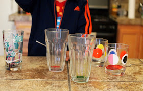add food coloring to create water xylophone