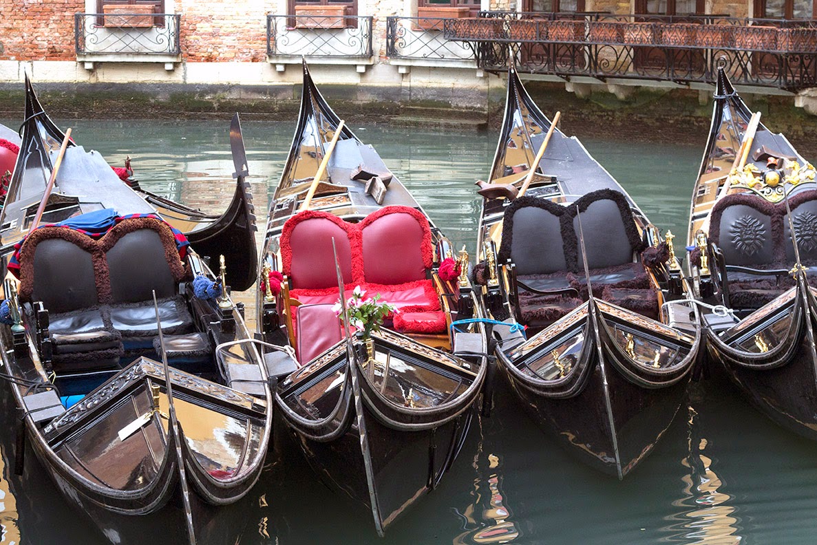 five moored gondolas