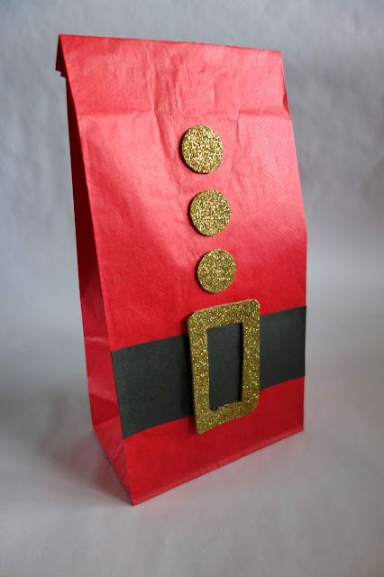 paper bag crafts, paper crafts, turn a paper bag into a Santa Claus outfit