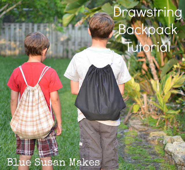 2 boys standing wearing drawstring backpacks DIY Drawstring Backpack Tutorial - Blue Susan Makes