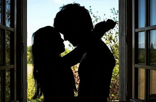 boy and girl romancing kissing.jpg