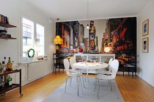Beautiful White Room with Blue Sofa with White Dining