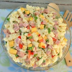 Ham and Cheese Pasta Salad A simple, yet popular, delicious Ham and Cheese Pasta Salad with just enough dressing to make it tasty enough for seconds (or thirds ! )