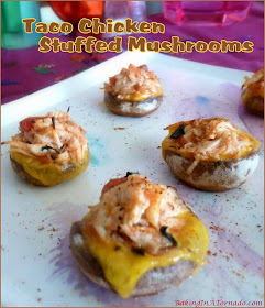 Chicken Taco Stuffed Mushrooms, a bite sized appetizer packed with chicken taco flavor. Simple to make, fun to share. | Recipe developed by www.BakingInATornado.com | #recipe #appetizer