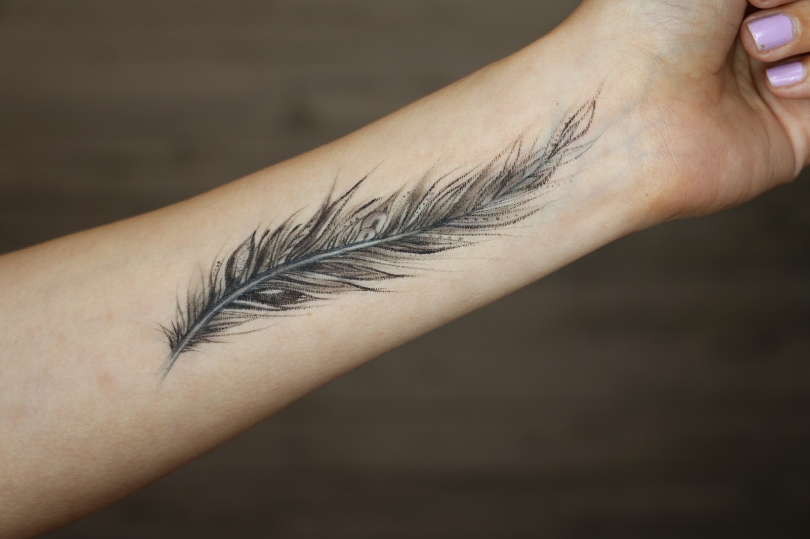 quill tattoo foot