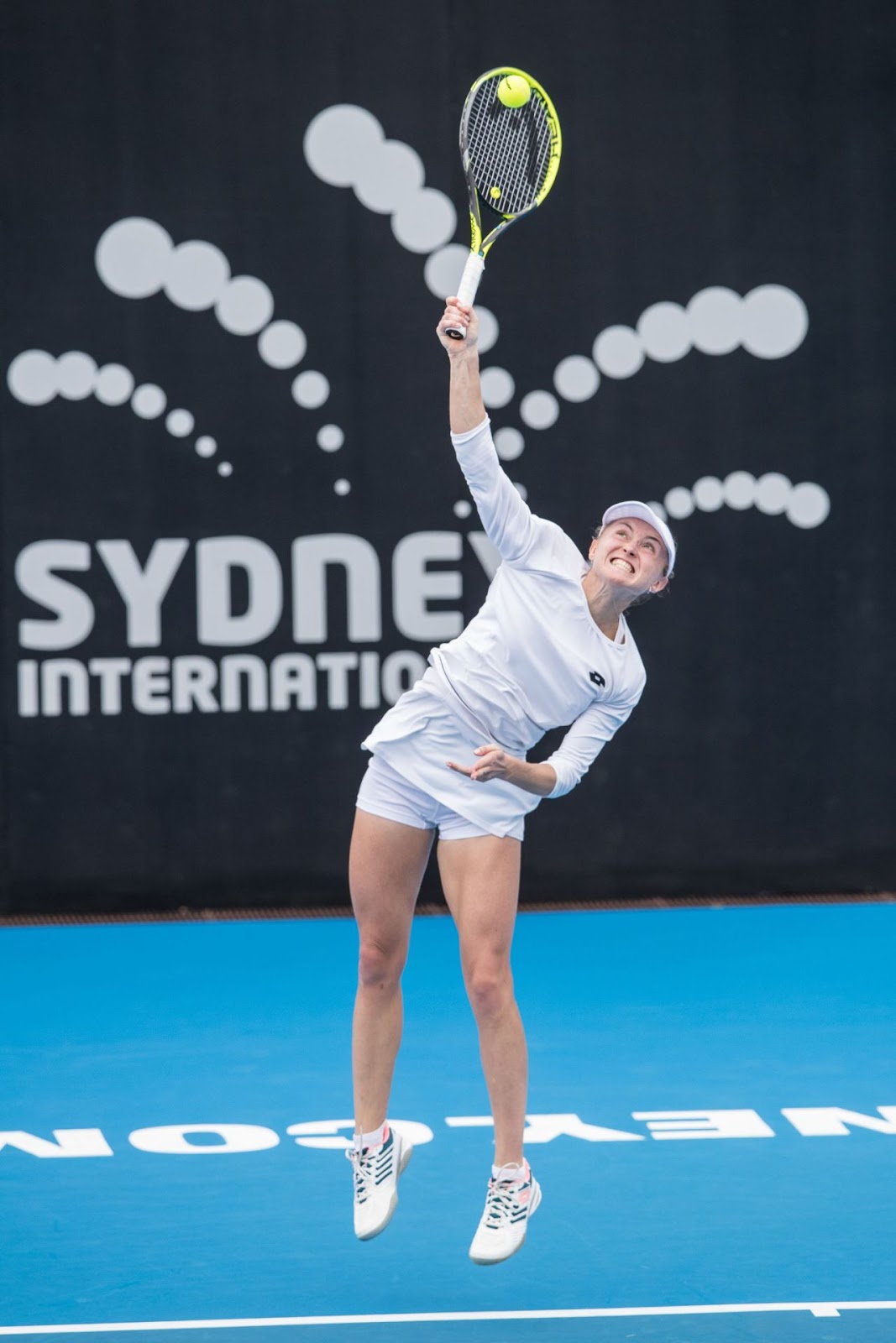 Aliaksandra Sasnovich in White Dress at 2019 Sydney International
