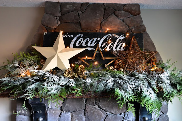 Coca Cola inspired Christmas fireplace mantel decorating with stars - via : https://www.funkyjunkinteriors.net/