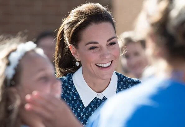 Kate Middleton wore a new floral print shirt dress by Beulah London. Crown Princess wore the same dress. Patrick Mavros quartz earrings