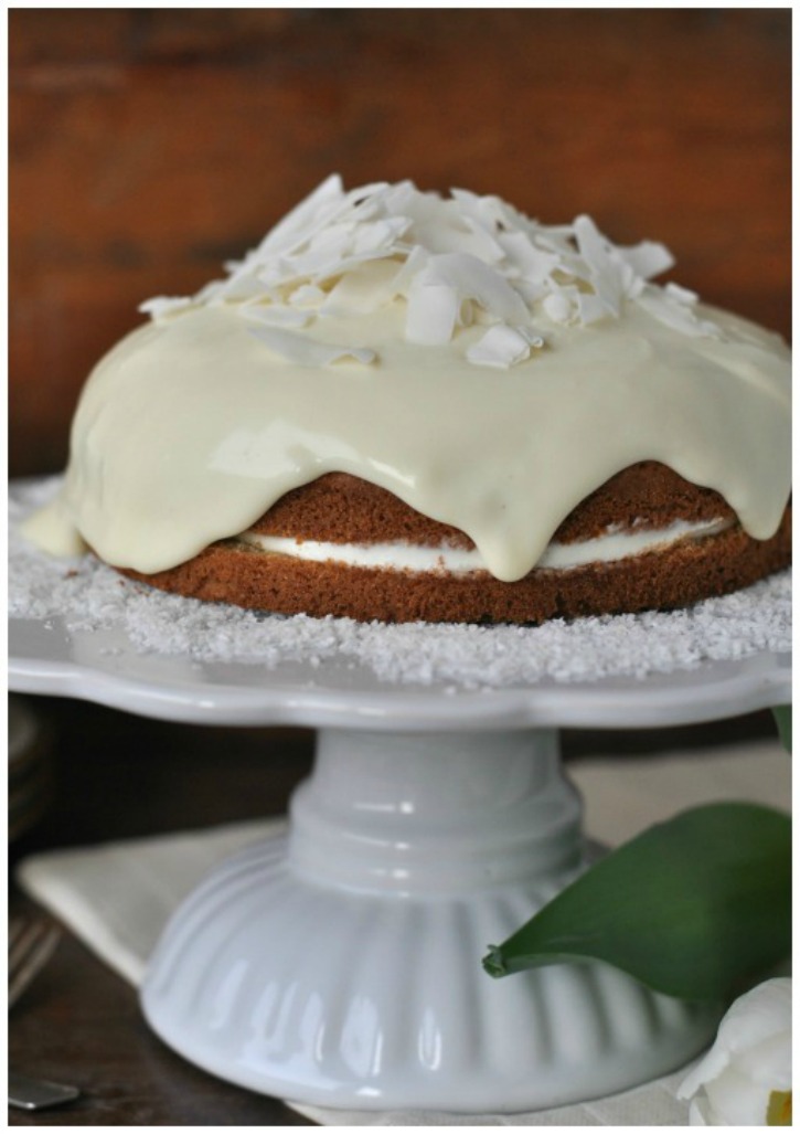 rich coconut-cake with cream cheese topping and white chocolate, gluten free