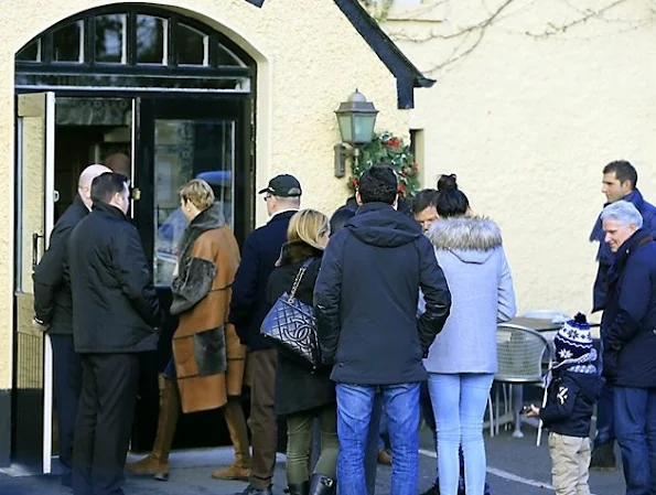 Princess Charlene visited Drogheda Monasterboice Inn in Dublin, Ireland. Princess Charlene wore fur coat, diamond pearl earrings wore leather long boots