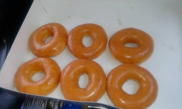Icing glazed doughnuts 