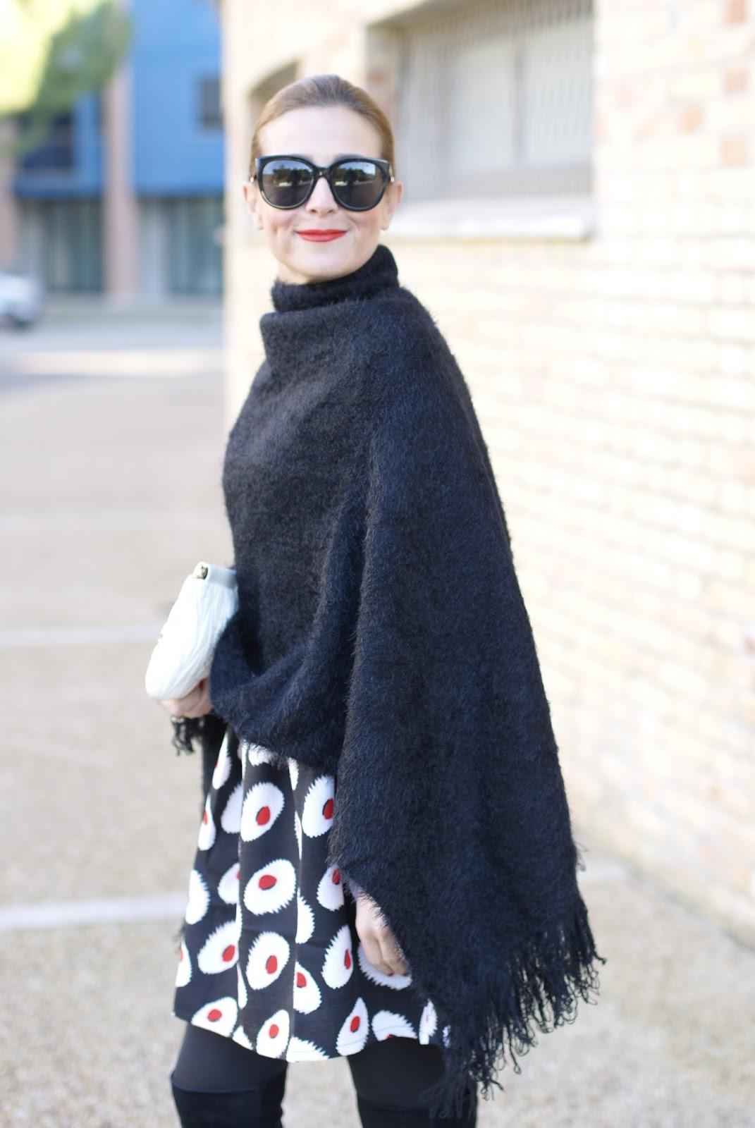 How to wear a black cape from Katherine Kelly Lang Kelly Kloset on Fashion and Cookies fashion blog, fashion blogger style