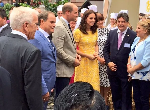 The Duchess wore Jenny Packham Yellow Dress for Heidelberg visit. Kate's wearing her Monsoon Fleur wedges