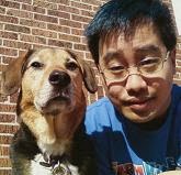 Photograph of Paul Lai and dog