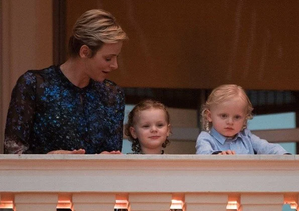 Princess Charlene, Princess Gabriella and Prince Jacques watched the traditional celebrations of St. John's Day procession at Palace Square in Monaco