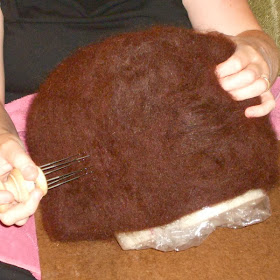 needle felting a wool hat
